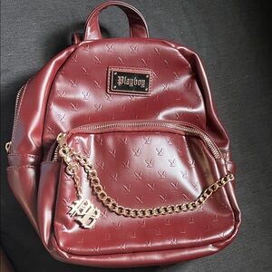 PLAYBOY Mini Backpack in Burgundy with Gold Chain Accent